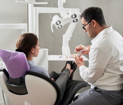 Dentist With Patient